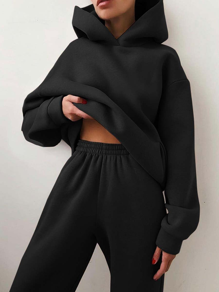 Woman in a hoodie and joggers tracksuit
