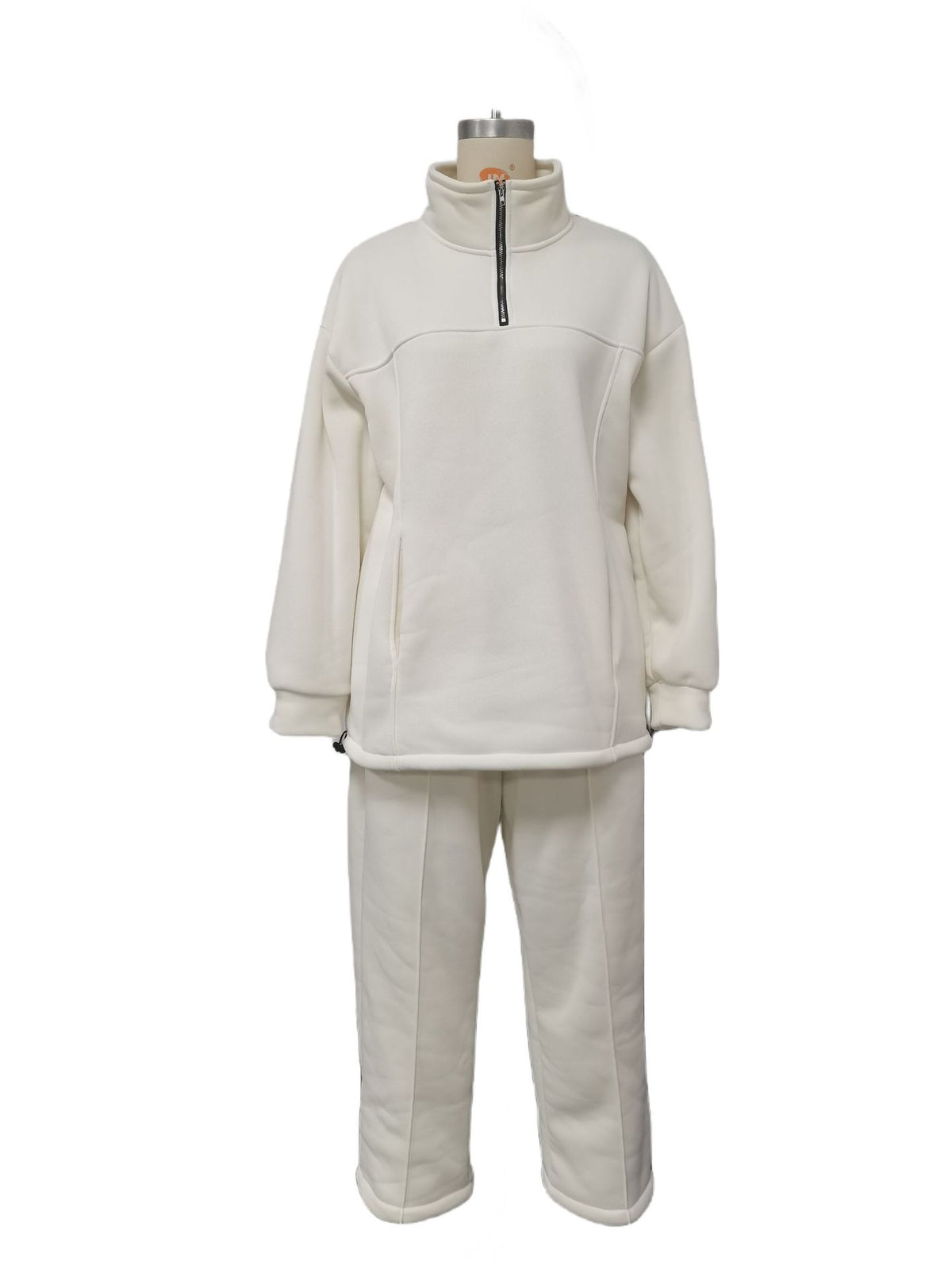 Woman in a fleece half-zip tracksuit