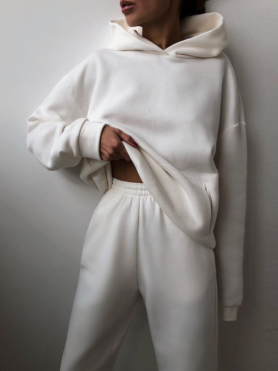 Woman in a hoodie and joggers tracksuit