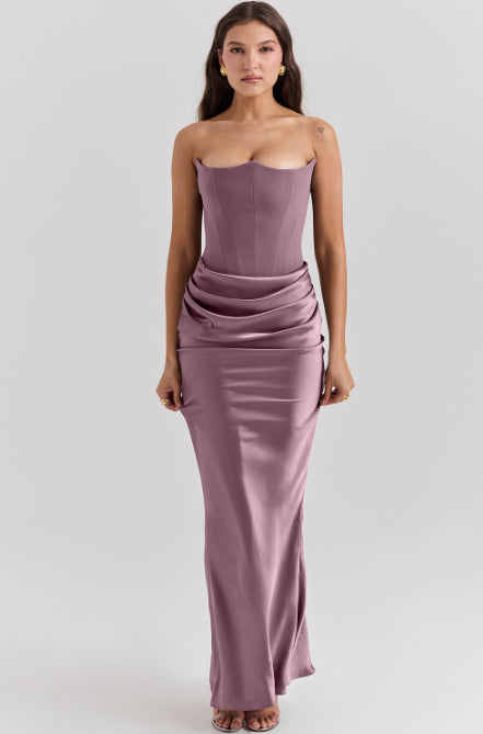Woman in a strapless satin maxi dress