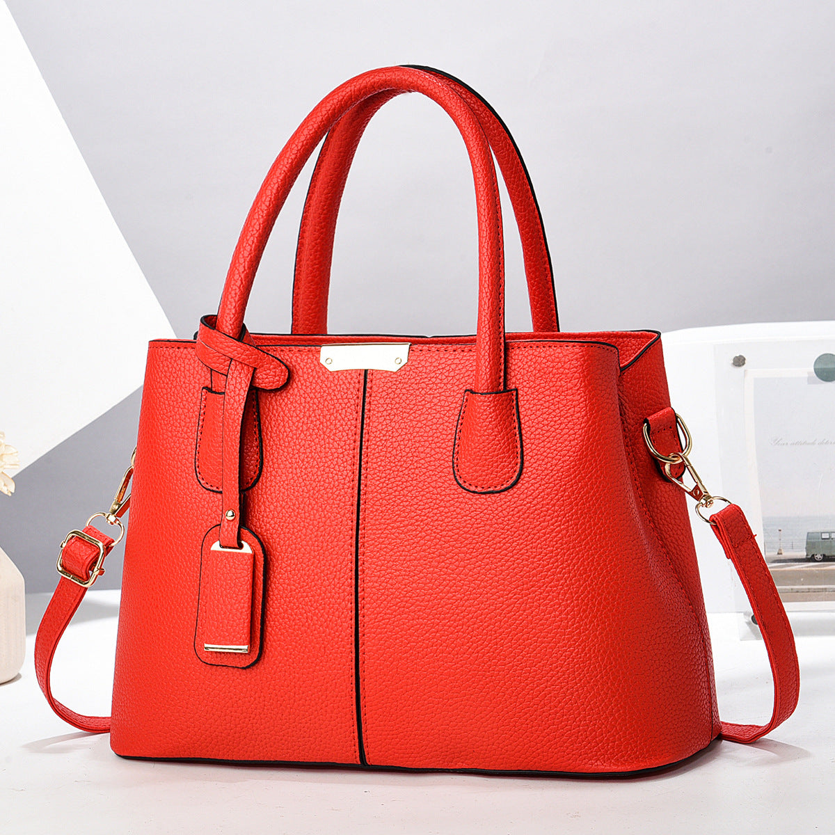 Structured faux leather tote handbag