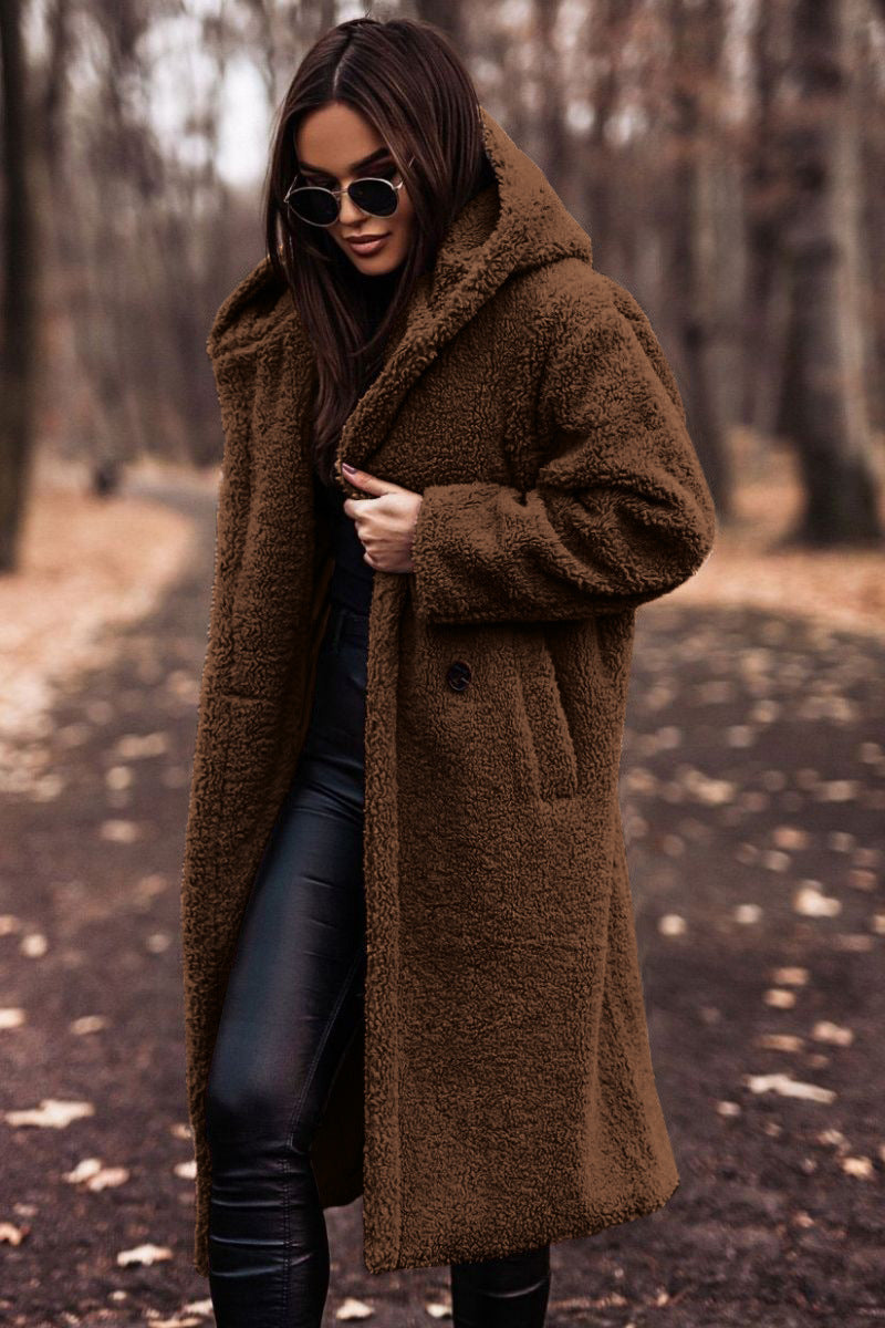 Woman in long hooded teddy coat