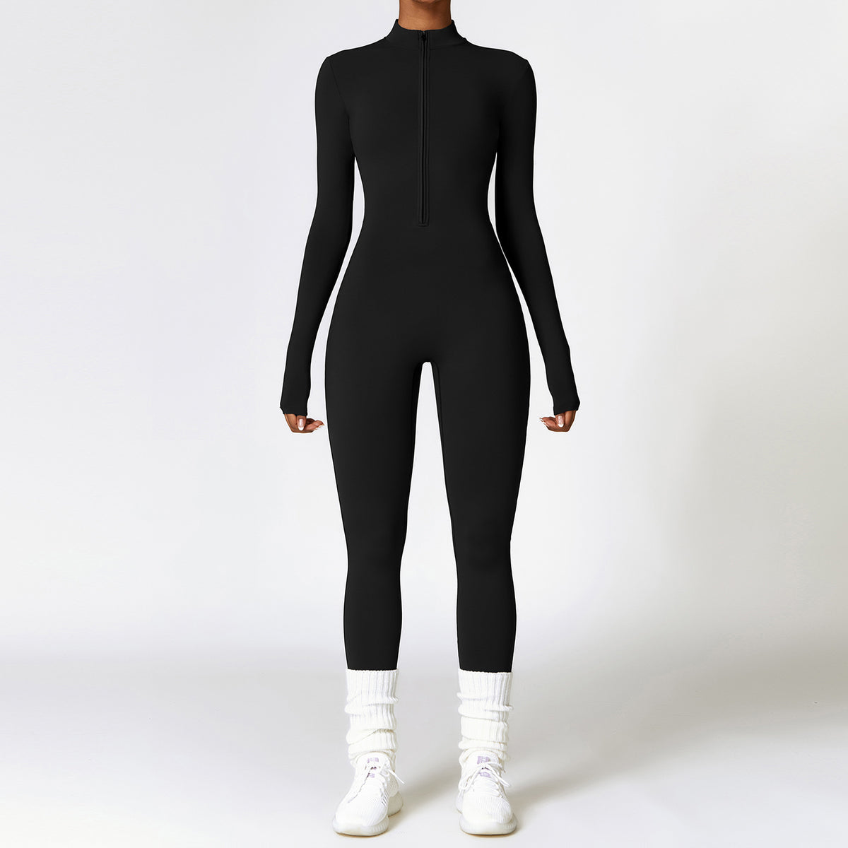 Woman in a zip-front yoga jumpsuit