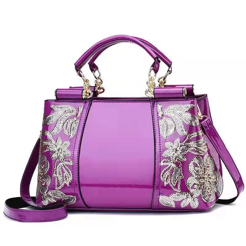 Sequin embroidered patent evening handbag