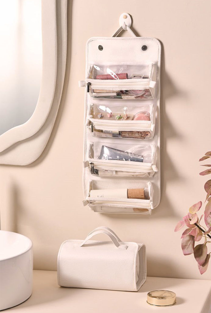 Foldable travel toiletry bag with clear pouches
