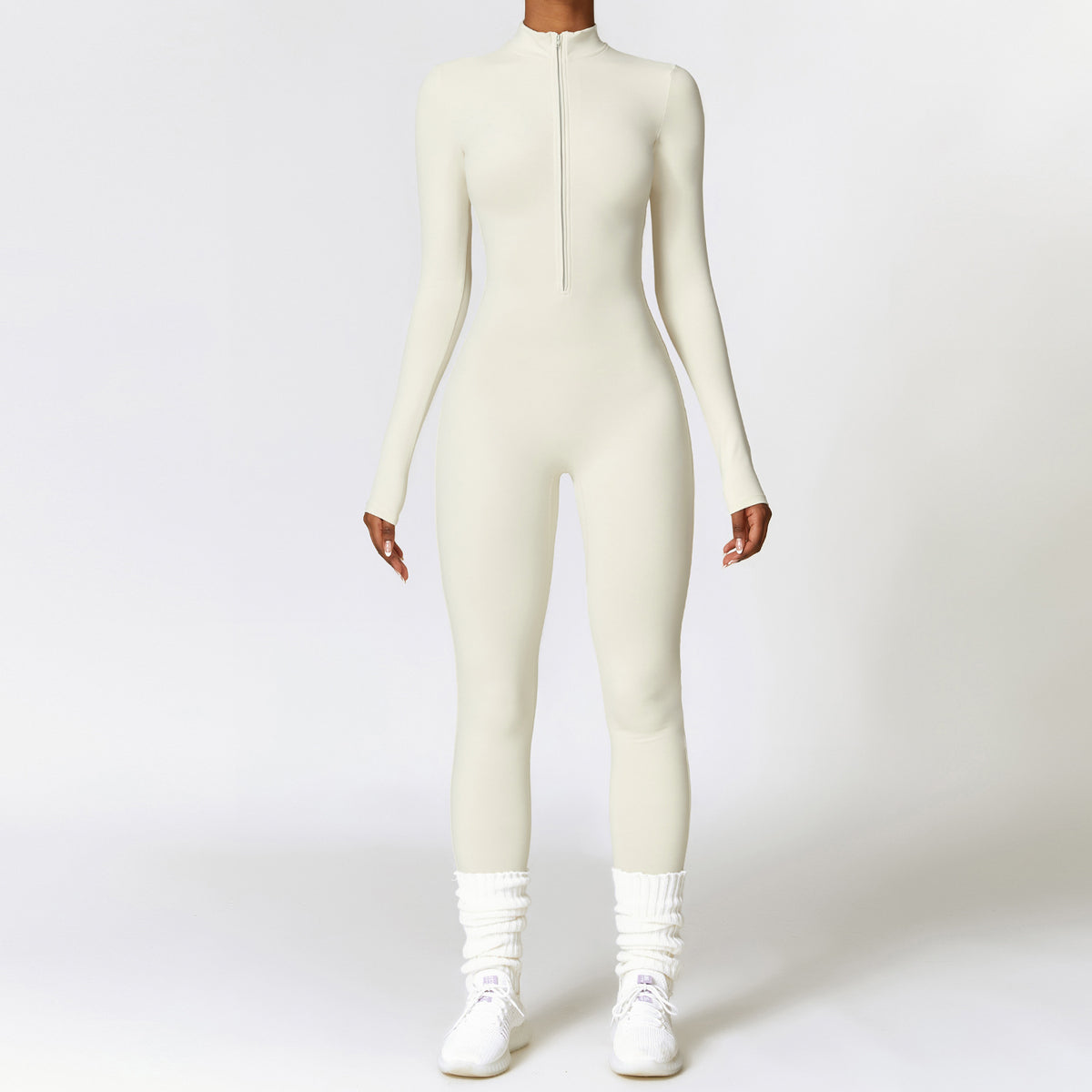 Woman in a zip-front yoga jumpsuit