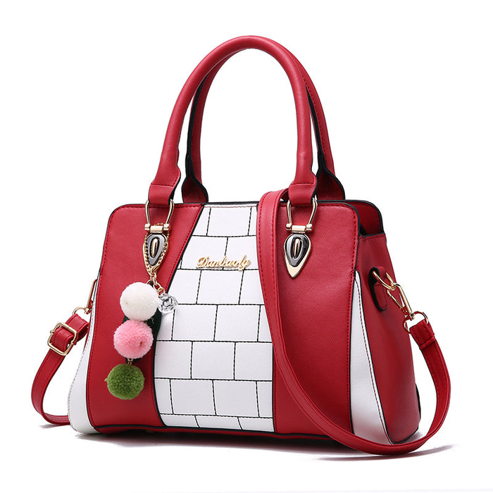 Imogen | Two-tone shoulder bag with pompom charm