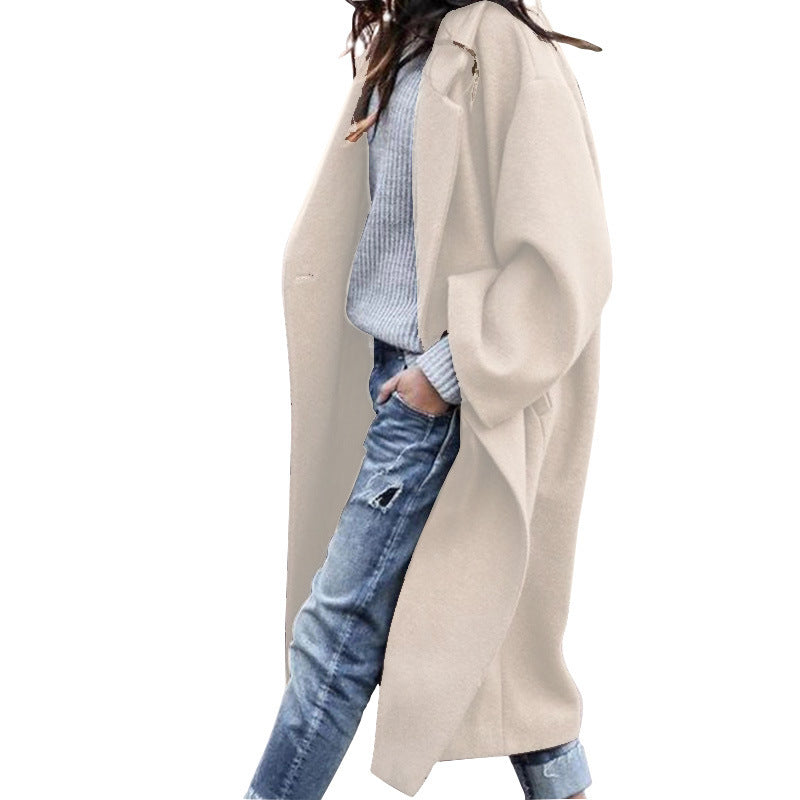 Woman wearing long oversized lapel coat