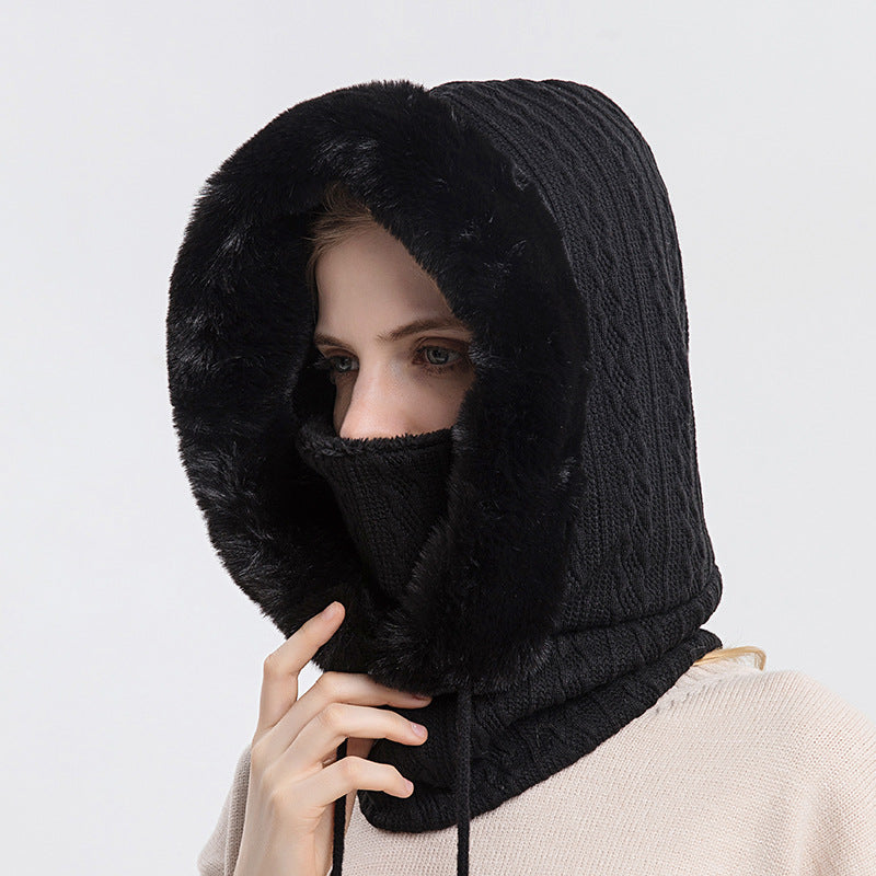 Knitted hood with faux fur trim