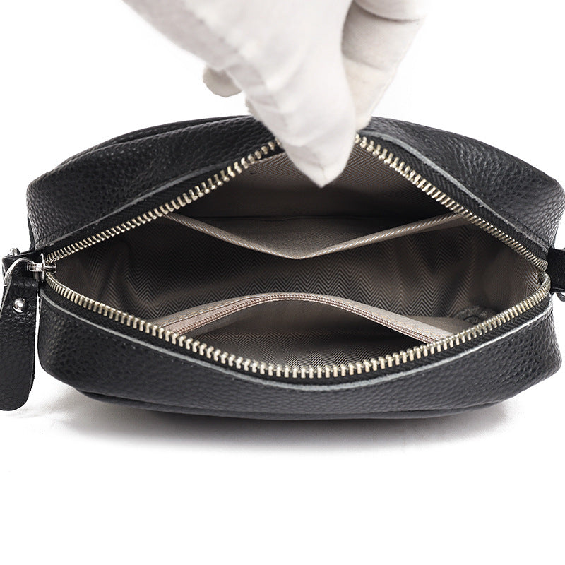 Small leather crossbody bag with patterned strap
