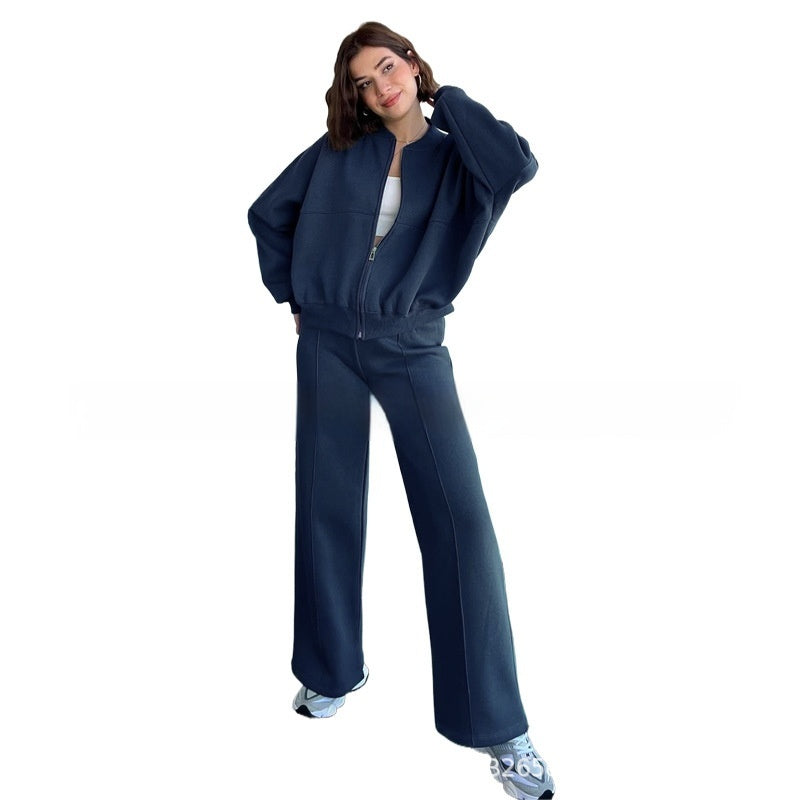 Woman in a zip jacket and wide-leg trousers set