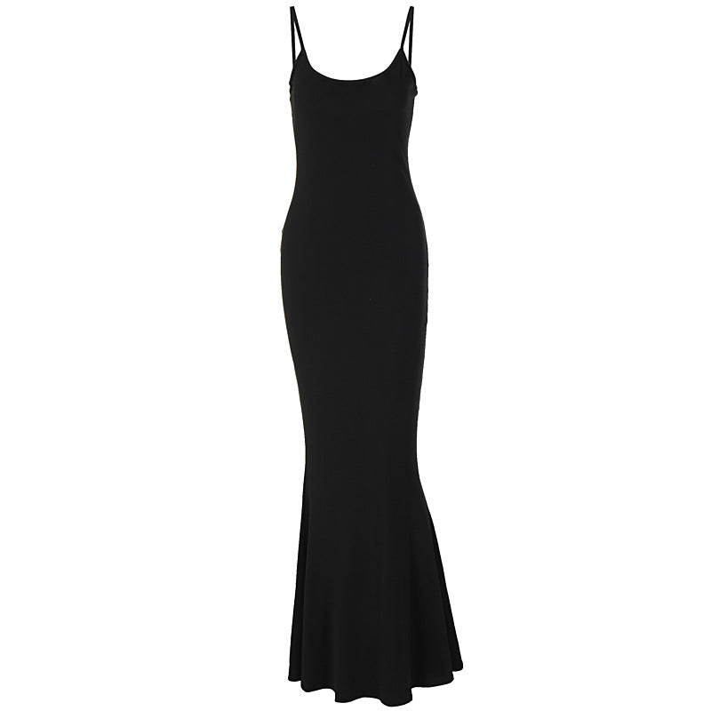 Woman in black bodycon maxi dress