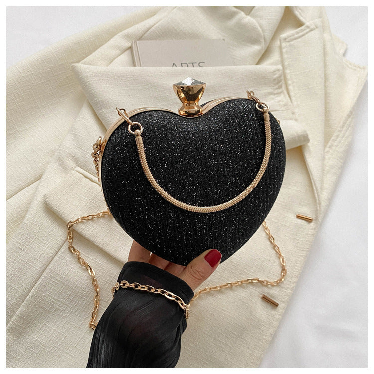 Heart-shaped evening clutch with chain