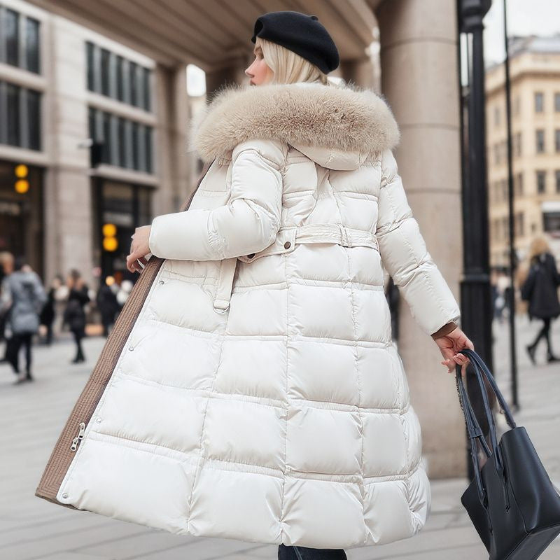 Woman in a long parka with faux fur hood