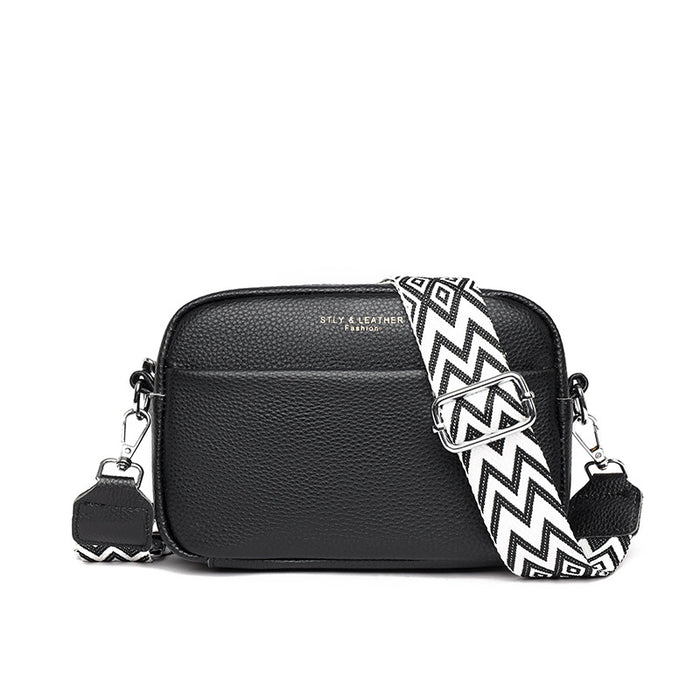 Evie | Small leather crossbody bag with wide strap