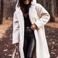 Woman in long hooded teddy coat