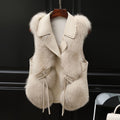 Woman in a short faux fur gilet