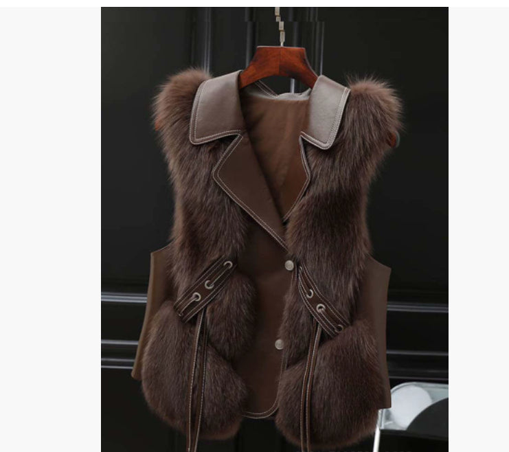 Woman in a short faux fur gilet