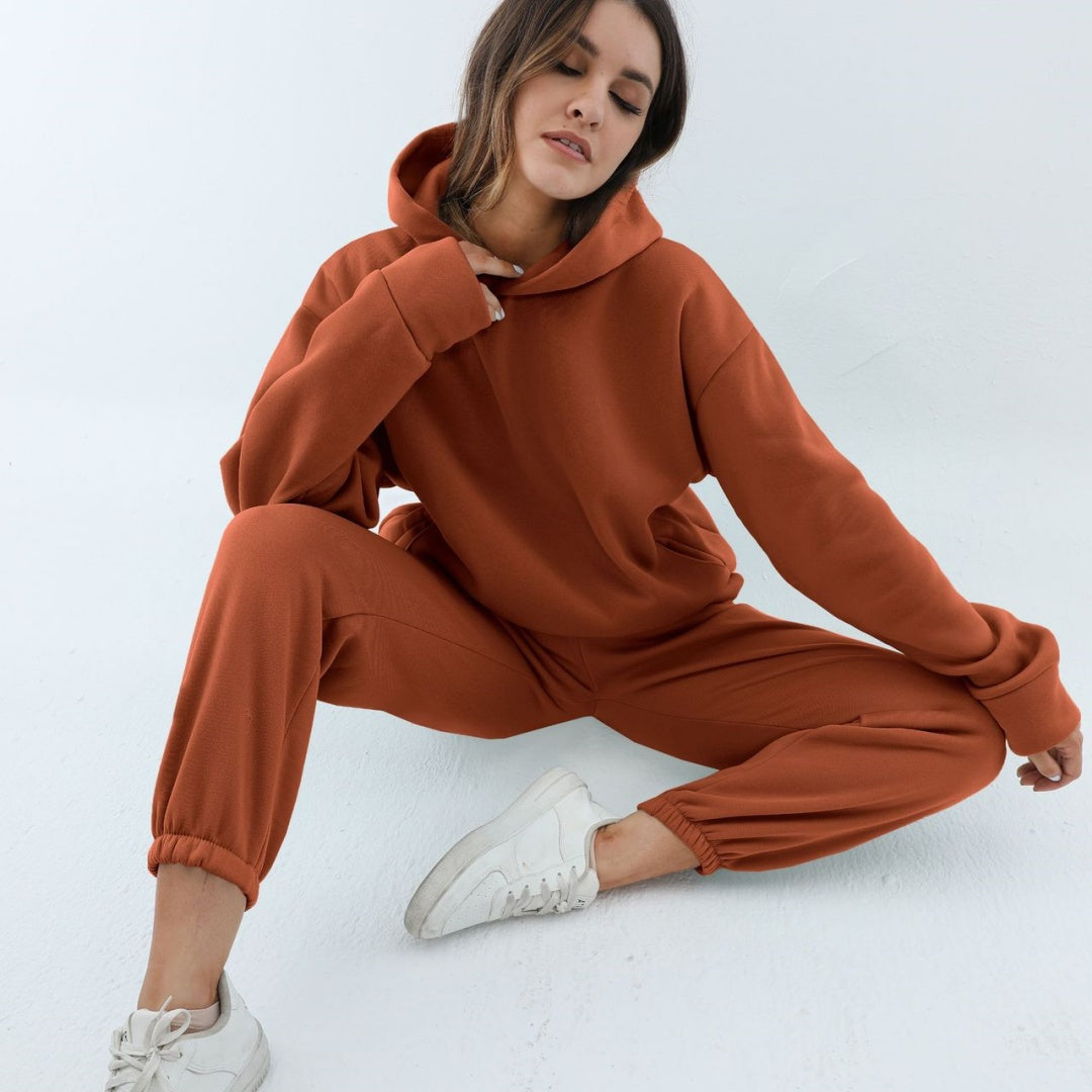 Woman in a hoodie and joggers tracksuit