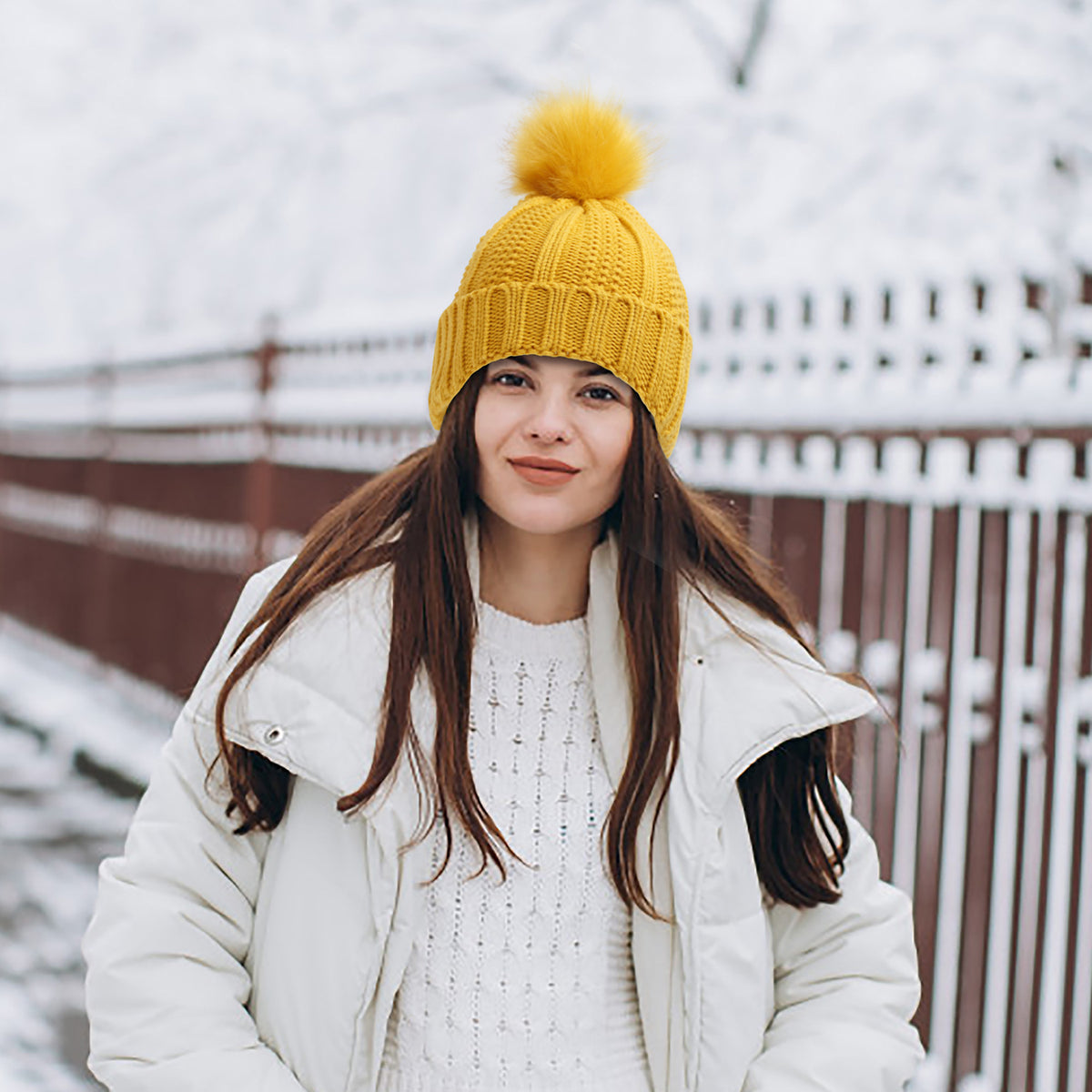 Chunky knit beanie with faux fur pom pom