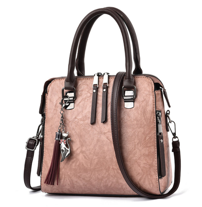 Vintage faux leather handbag with tassel