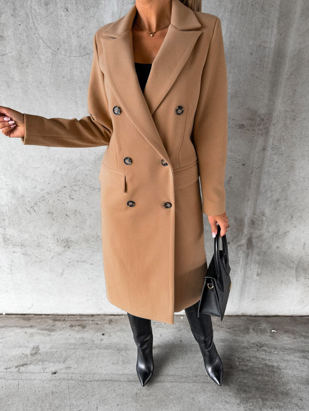 Woman in long double-breasted coat